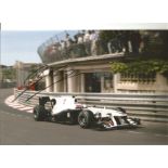 Kamui Kobayashi signed 12 x 8 colour Motor Racing in car action photo with COA from leading