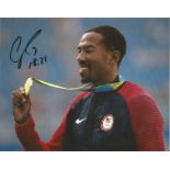 Christian Taylor Signed Olympic Gold 8x10 Photo . Good Condition. All signed pieces come with a