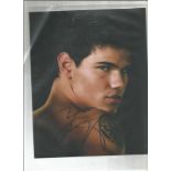 Taylor Lautner signed 10 x 8 colour photo from The Twilight Saga. Good Condition. All signed