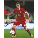 Chris Mepham Signed Wales 8x10 Photo . Good Condition. All signed pieces come with a Certificate