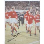 Jack Charlton signed 10 x 8 inch photo of World Cup winner Jack Charlton parading around Wembley
