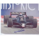 Mario Andretti signed 10 x 8 inch Motor Racing photo during F1 race. Good Condition. All signed