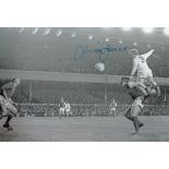 Leeds United Mick Jones, Football Autographed 12 X 8 Photo, A Superb Image Depicting Jones Soaring