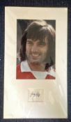 George Best signature piece mounted below colour photo. Approx overall size 21x12. Good Condition.
