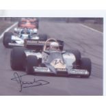 Jody Scheckter signed 10 x 8 inch Motor Racing photo during F1 race. Good Condition. All signed