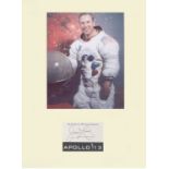 Apollo 13 Astronaut James Lovell. Signature mounted below NASA portrait. Professionally mounted to