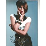 Cheryl Cole signed 12x8 colour photo. Good Condition. All signed pieces come with a Certificate of