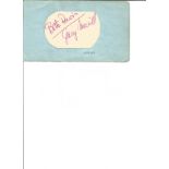 Bette Davis and Gary Merrill signature piece stuck to album page. Good Condition. All signed