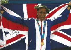 Kelly Holmes Signed 2004 Athens Olympic 8x12 Photo . Good Condition. All signed pieces come with a