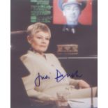 Dame Judi Dench signed 10 x 8 inch photo in character from James Bond. Good Condition. All signed