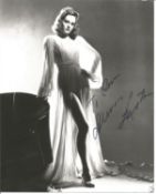 Alexis Smith signed 10x8 black and white photo. Dedicated. Good Condition. All signed pieces come