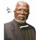 John Kani Actor Signed 8x10 Photo . Good Condition. All signed pieces come with a Certificate of