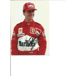 Eddie Irvine signed 8x6 colour photo. Slightly smudged. Good Condition. All signed pieces come