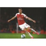 Granit Xhaka Signed Arsenal 8x12 Photo . Good Condition. All signed pieces come with a Certificate
