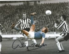 Football Dennis Tueart 10x8 signed colour enhanced photo pictured in action for Manchester City.