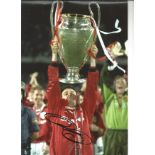 Football Ryan Giggs 12x8 signed colour photo pictured lifting the champions league trophy while at