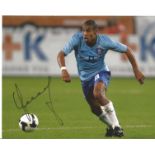 Football Nigel De Jong 8x10 signed colour photo pictured in action for Holland. Good Condition.