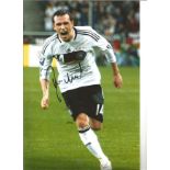 Football Piotr Trochowski 12x8 signed colour photo pictured in action for Germany. Good Condition.