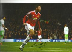 Football Chris Smalling 12x8 signed colour photo pictured in action for Manchester United. Good