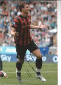 Football Edin Dzeko 12x8 signed colour photo pictured celebrating while playing for Manchester City.
