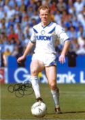 Football Andy Ritchie signed 14x10 colour photo pictured in action for Leeds United. Good Condition.