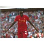 Football Divock Origi 8x12 signed colour photo pictured in action for Liverpool. Good Condition. All