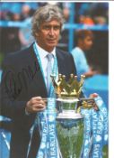 Football Manuel Pellegrini 12x8 signed colour photo pictured with the Premier league trophy while