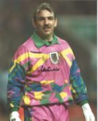 Football Neville Southall signed 10x8 colour photo pictured while playing for Wales. Good Condition.