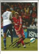 Football Dirk Kuyt 12x8 signed colour photo pictured in action for Liverpool. Good Condition. All