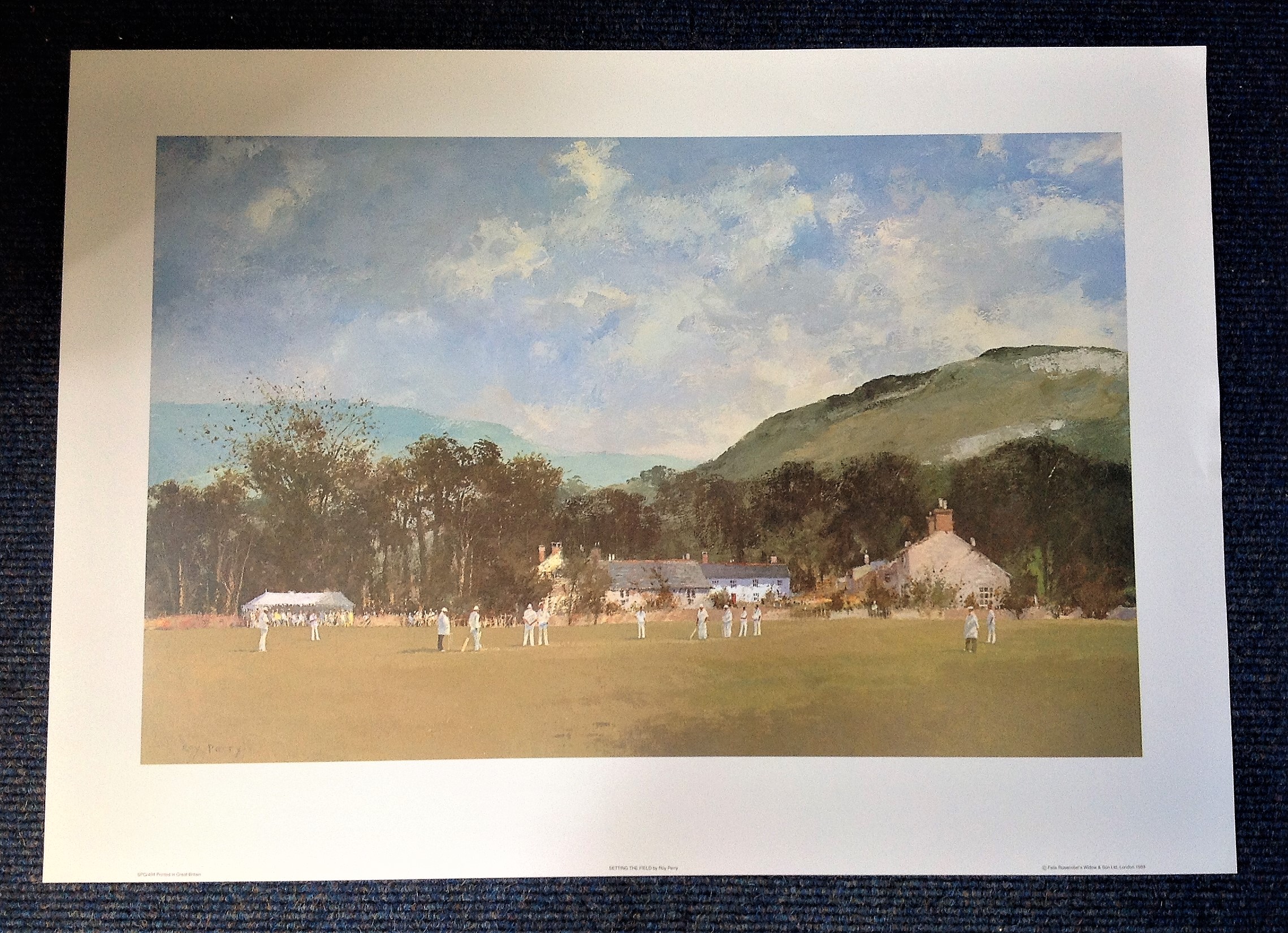 Cricket print approx 26x18 titled Setting the field by the artist Roy Perry picturing a typical