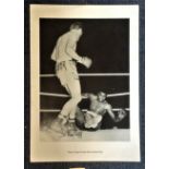 Boxing Sir Henry Cooper signed 18x14 black and white print picturing the moment when he knocked down