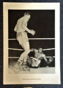 Boxing Sir Henry Cooper signed 18x14 black and white print picturing the moment when he knocked down