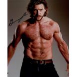 Blowout Sale! Bitten Greyston Holt hand signed 10x8 photo. This beautiful hand signed photo