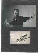 Lionel Ritchie signature piece mounted with photo to 10 x 8 inches overall. Good Condition. All
