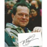 Terry Gilliam signed white card inscribed with unsigned 10 x 8 inch colour photo. Good Condition.