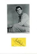 Rock Hudson signature piece mounted below black and white photo. Approx overall size 16x12. November