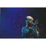 Emeli Sande Singer Signed 8x12 Photo. Good Condition. All signed pieces come with a Certificate of