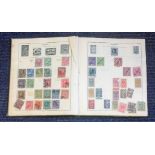 World used stamp collection in scruffy Strand stamp album. Hinged pages over 1000 from across the