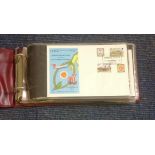 Isle of Man 1970/80s First Day Cover collection in red scruffy half sized album 44+ covers in good