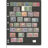 George VI Collection of stamps approx 60+ items BCW mint and used Includes Canada, Cyprus, Dominica,