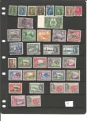 George VI Collection of stamps approx 60+ items BCW mint and used Includes Canada, Cyprus, Dominica,