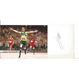 Oscar Pistorius Signed Page With Athletics Photo. Good Condition. All signed pieces come with a