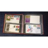 GB FDC collection in Red Album. 120+ covers mainly FDCs with some Air Letters, commemorative covers.