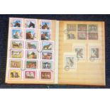 Pictorial Used and Mint Stamps collection in stock book. 12 Pages including Korea, Sharjah with lots