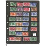 George VI Collection of 60 stamps on stock card BCW 1935 Coronation omnibus Mint and used Noted