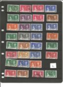 George VI Collection of 60 stamps on stock card BCW 1935 Coronation omnibus Mint and used Noted