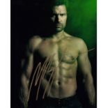 Blowout Sale! Arrow Manu Bennett hand signed 10x8 photo. This beautiful hand signed photo depicts