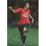 Football Fabio 10c8 signed colour photo pictured in action for Manchester United. Good Condition.