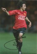 Football Fabio 10c8 signed colour photo pictured in action for Manchester United. Good Condition.