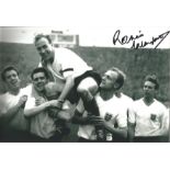 Ronnie Clayton and England Signed 12 x 8 inch football photo. Good Condition. All signed pieces come